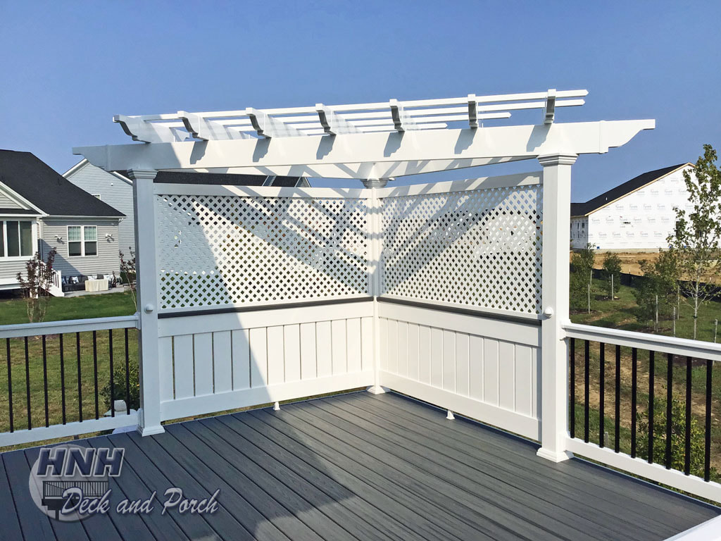 Deck with white vinyl pergola and iLighting