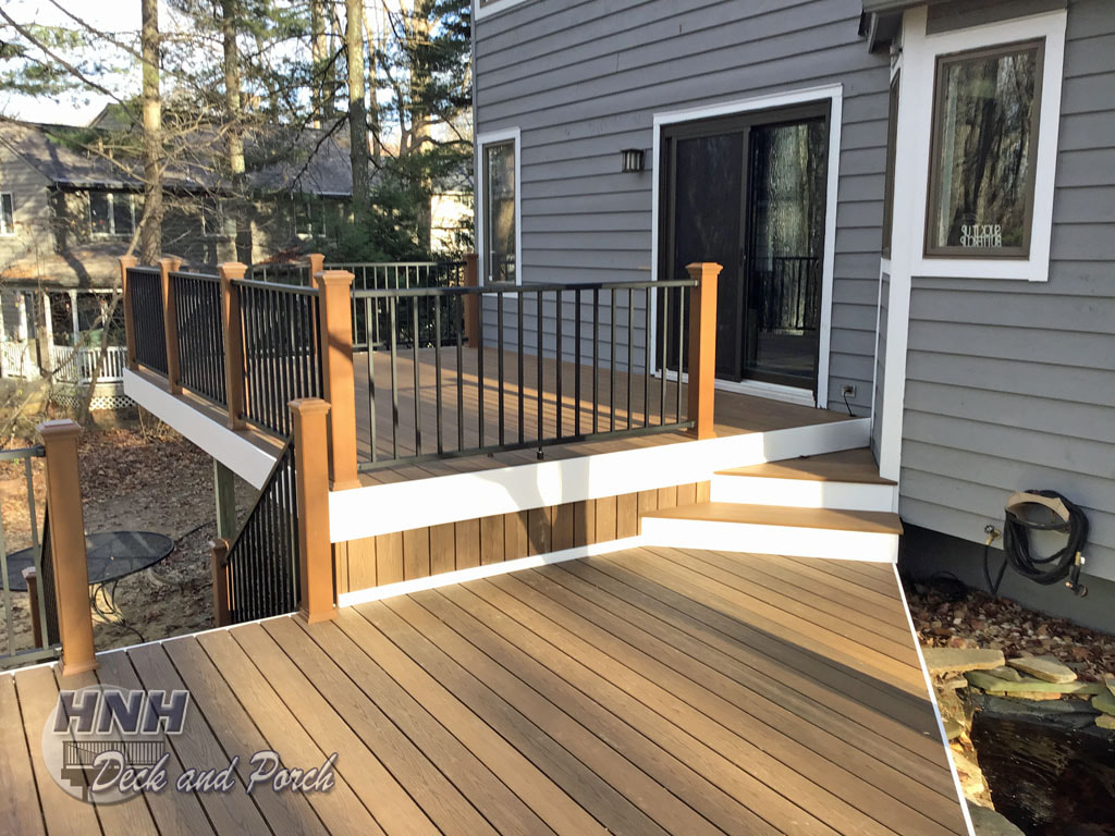 Fiberon Good Life Tuscan Villa decking, Westbury black aluminum railing with square balusters