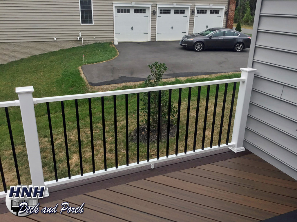 Trex Transcend composite deck with Westbury aluminum railing and balusters.