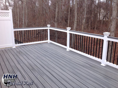 Composite decking using Trex Transcend Island Mist for the cap rail and flooring.