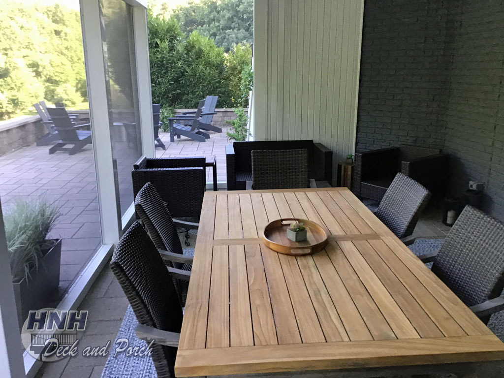 Trex Transcend, Westbury black aluminum railing, covered patio, storage room