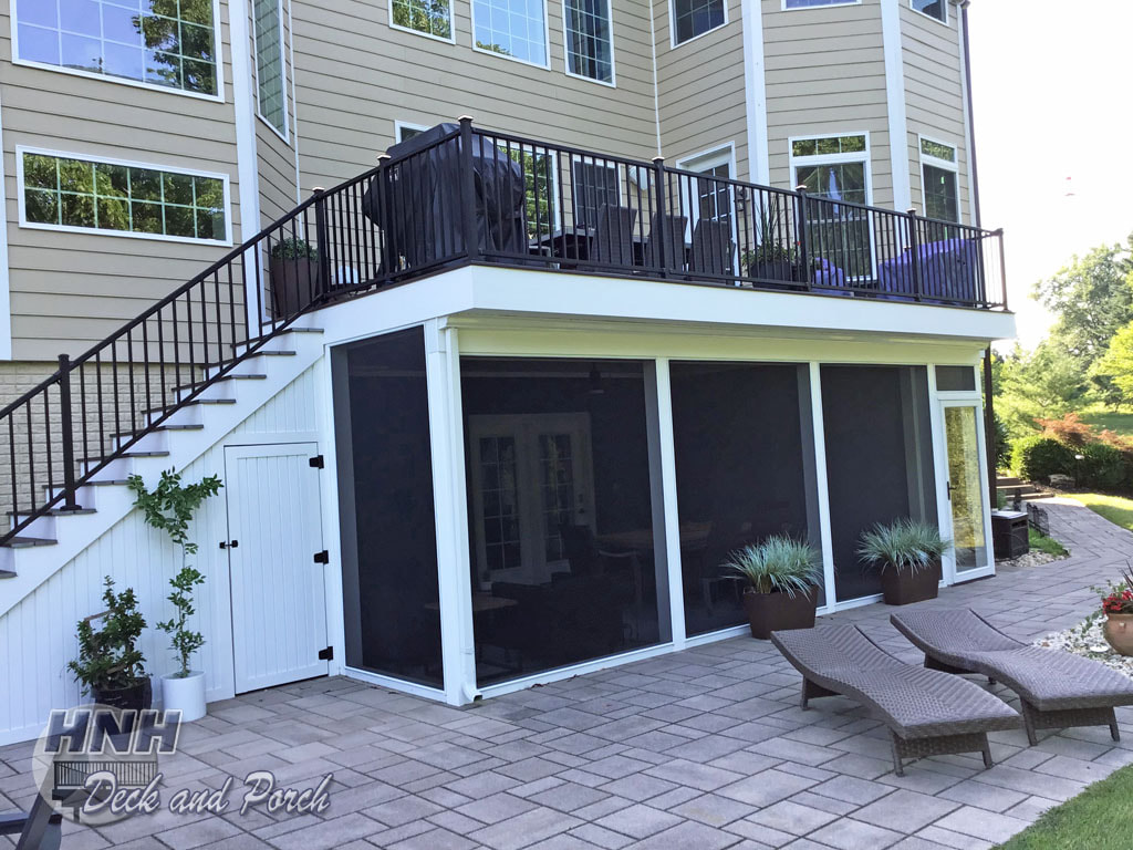 Trex Transcend, Westbury black aluminum railing, covered patio, storage room