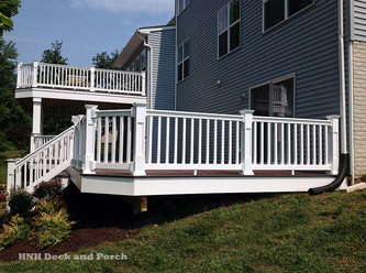 Wolf Home Products vinyl deck using white Shoreline Vinyl System railing with recessed posts.